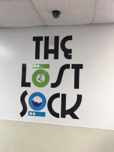 The Lost Sock Custom Lobby Vinyl Sign